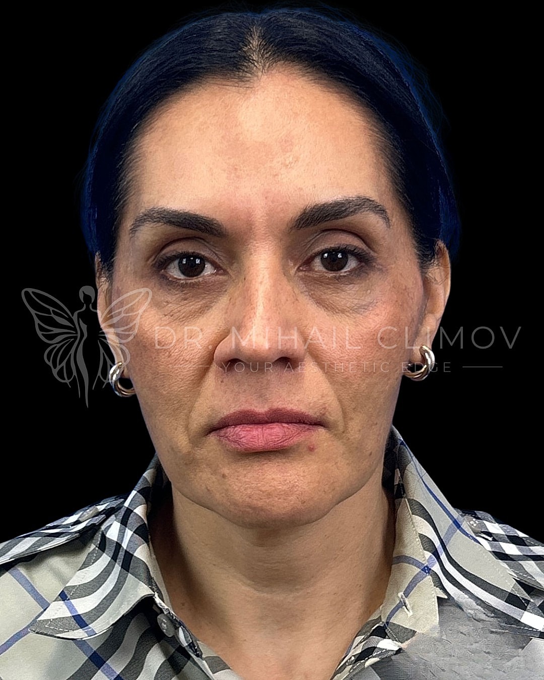 Close-up portrait of a woman with natural makeup.
